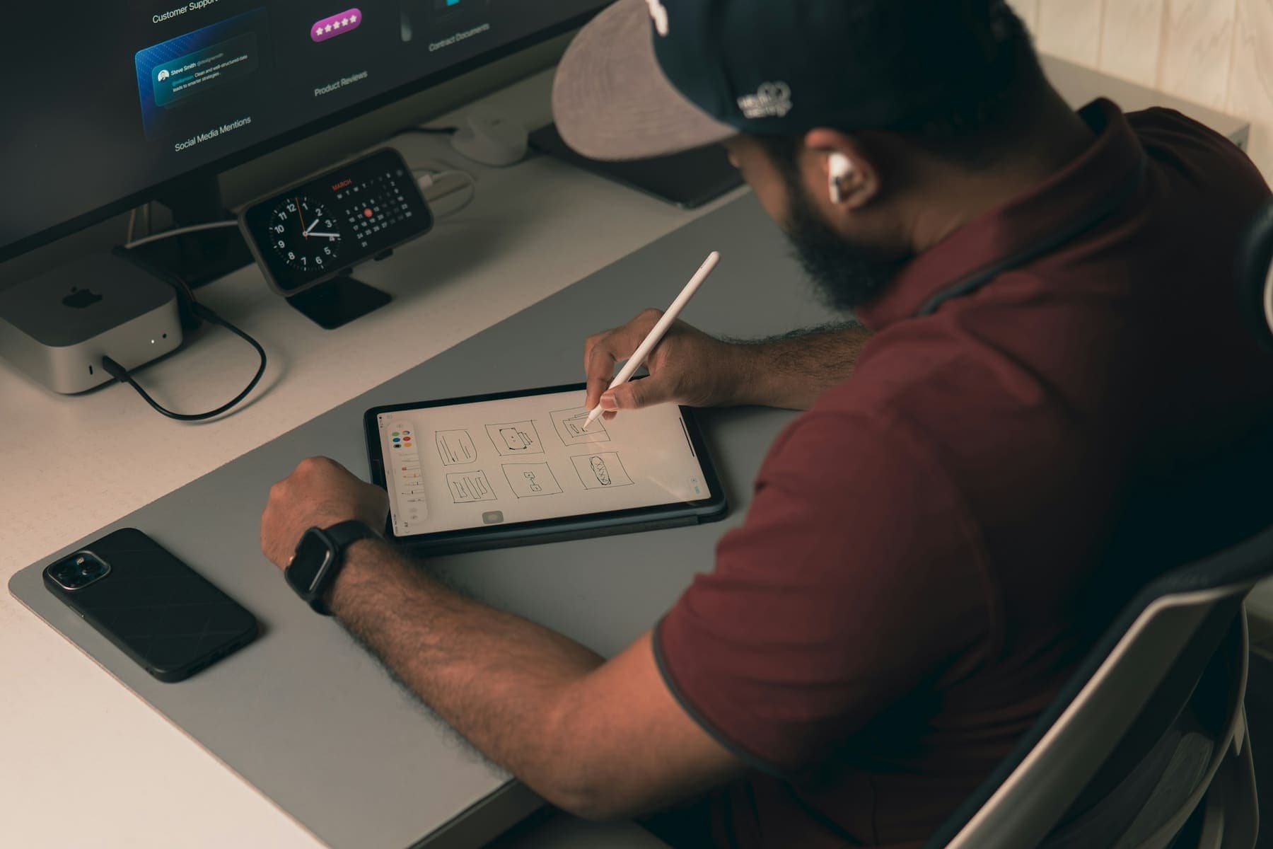 Designer working on interface layouts